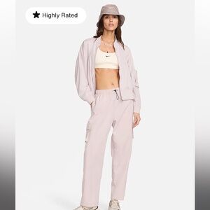 Nike Women's High-Rise Woven Cargo Pants in Light Pink size medium